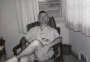 Dad sitting in chair black and white.jpg